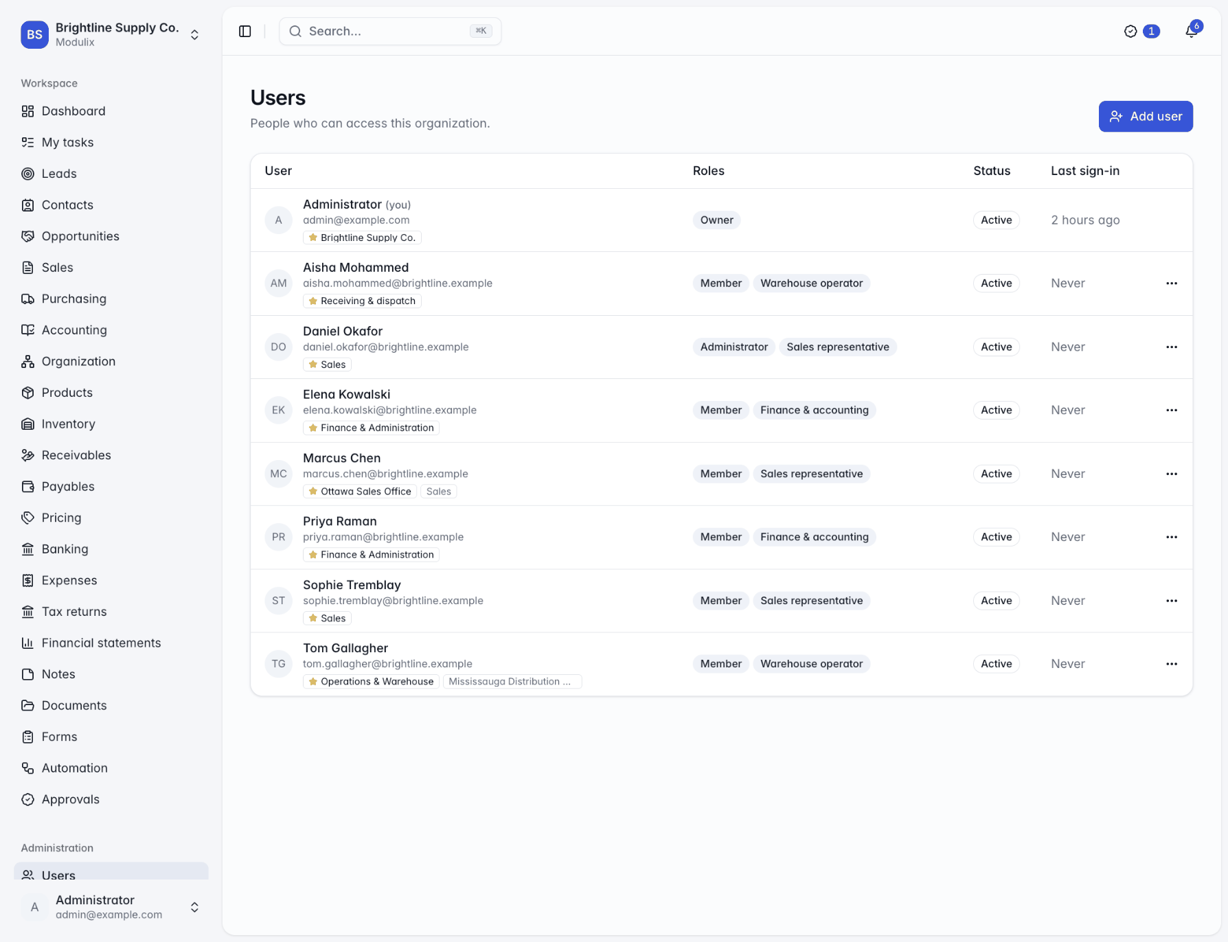 The Users page listing people with their roles, status and last sign-in