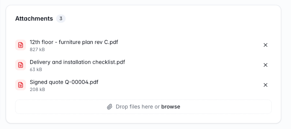 An Attachments card on a company's page listing three files and a drop zone