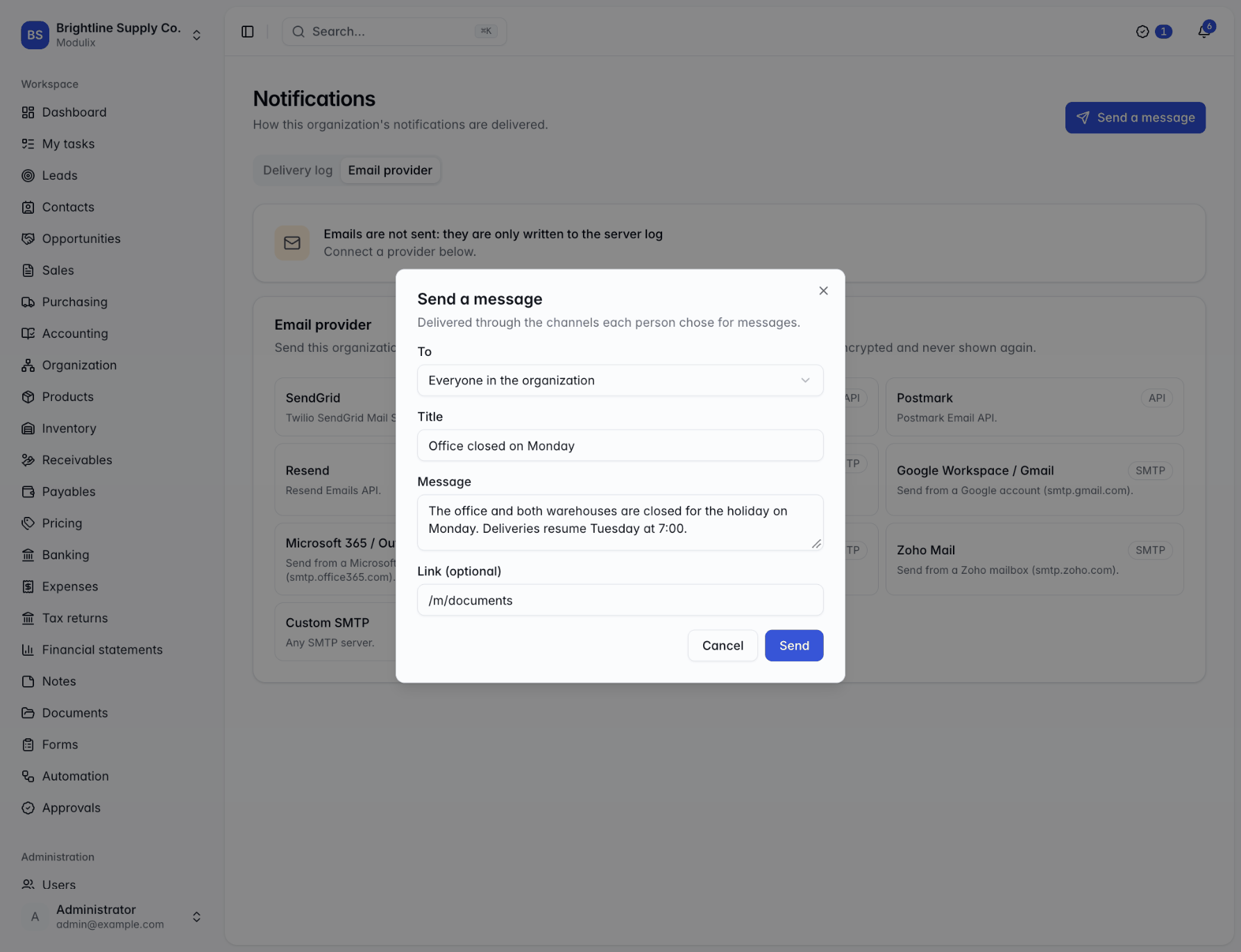 The Send a message dialog with To set to Everyone in the organization, a title, a message and a link