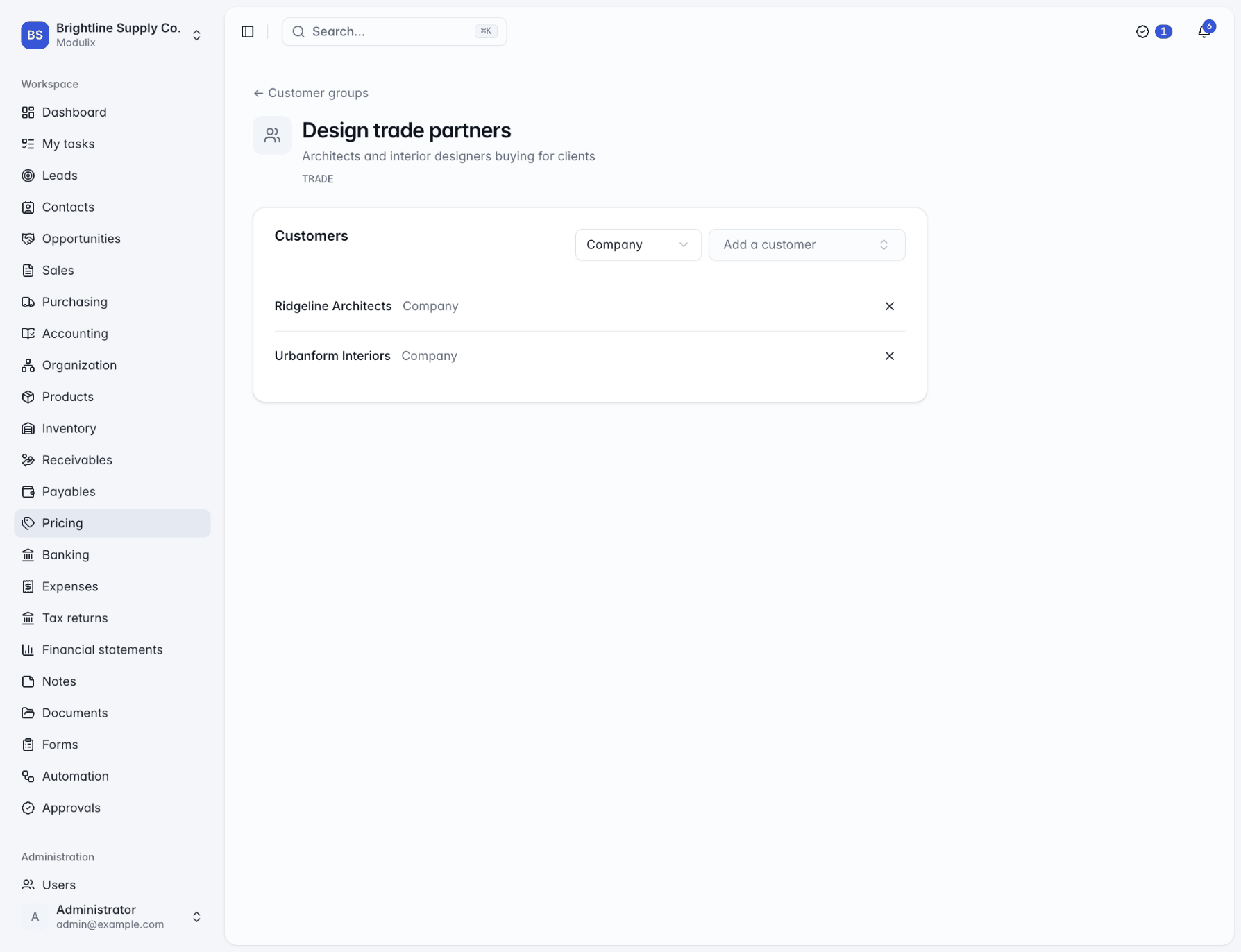A customer group page with its Customers card listing companies and contacts